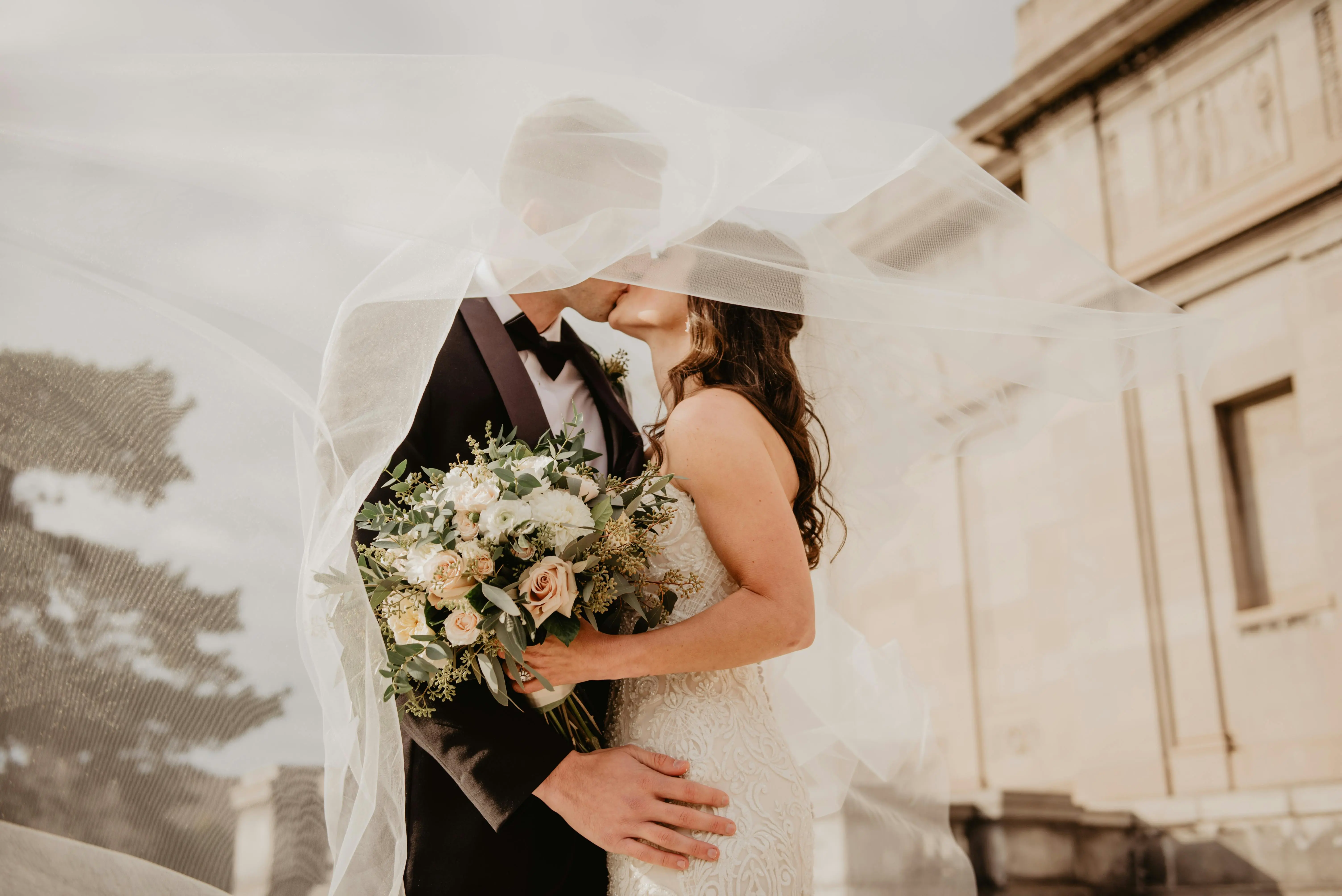 a couple posing at their wedding