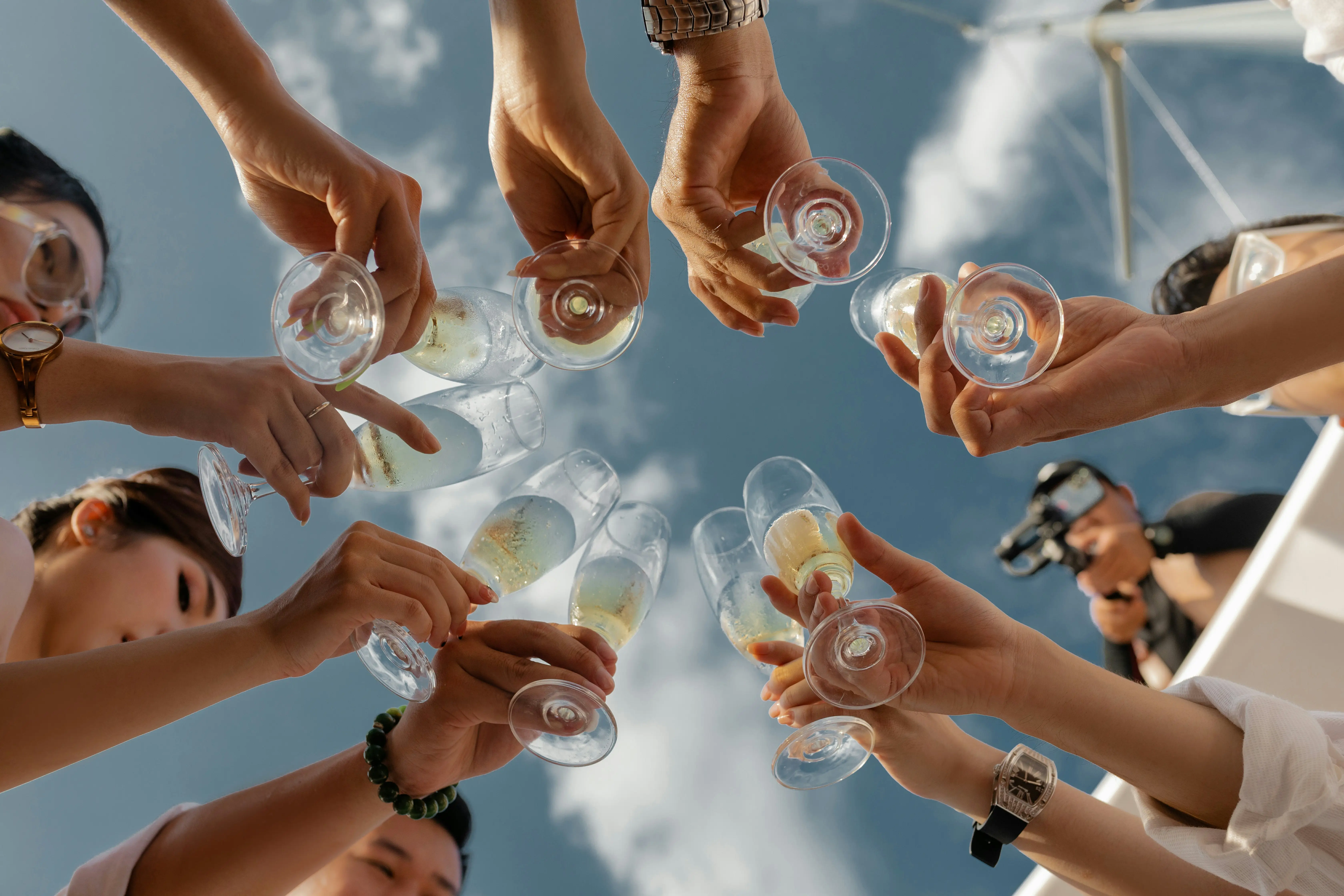 people cheering at a graduation party