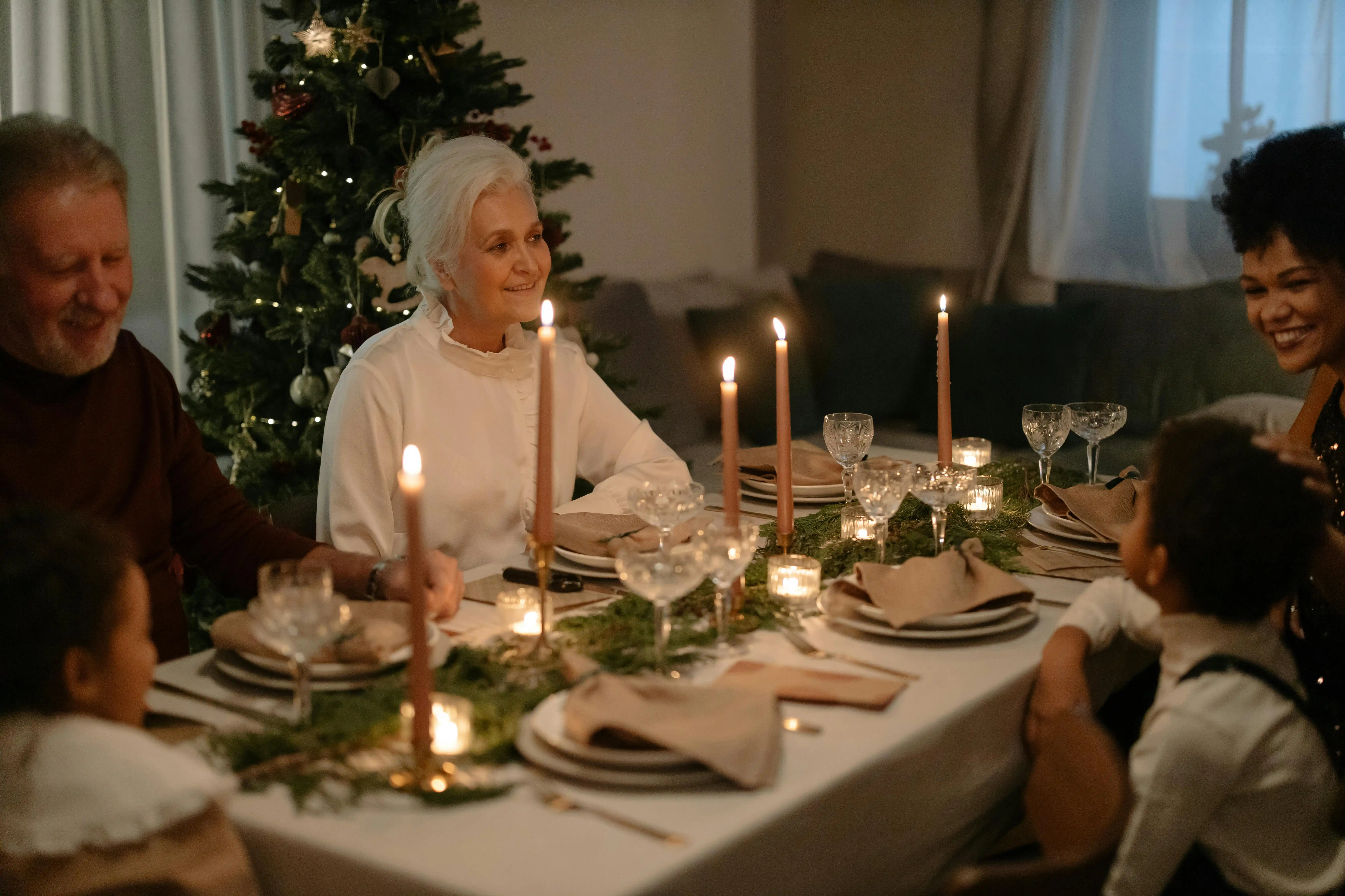a family gathered around a dining table